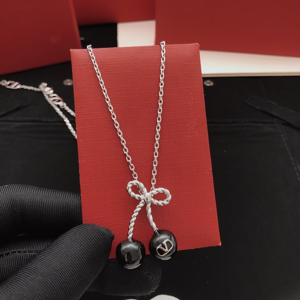 Black cherry bow necklace
