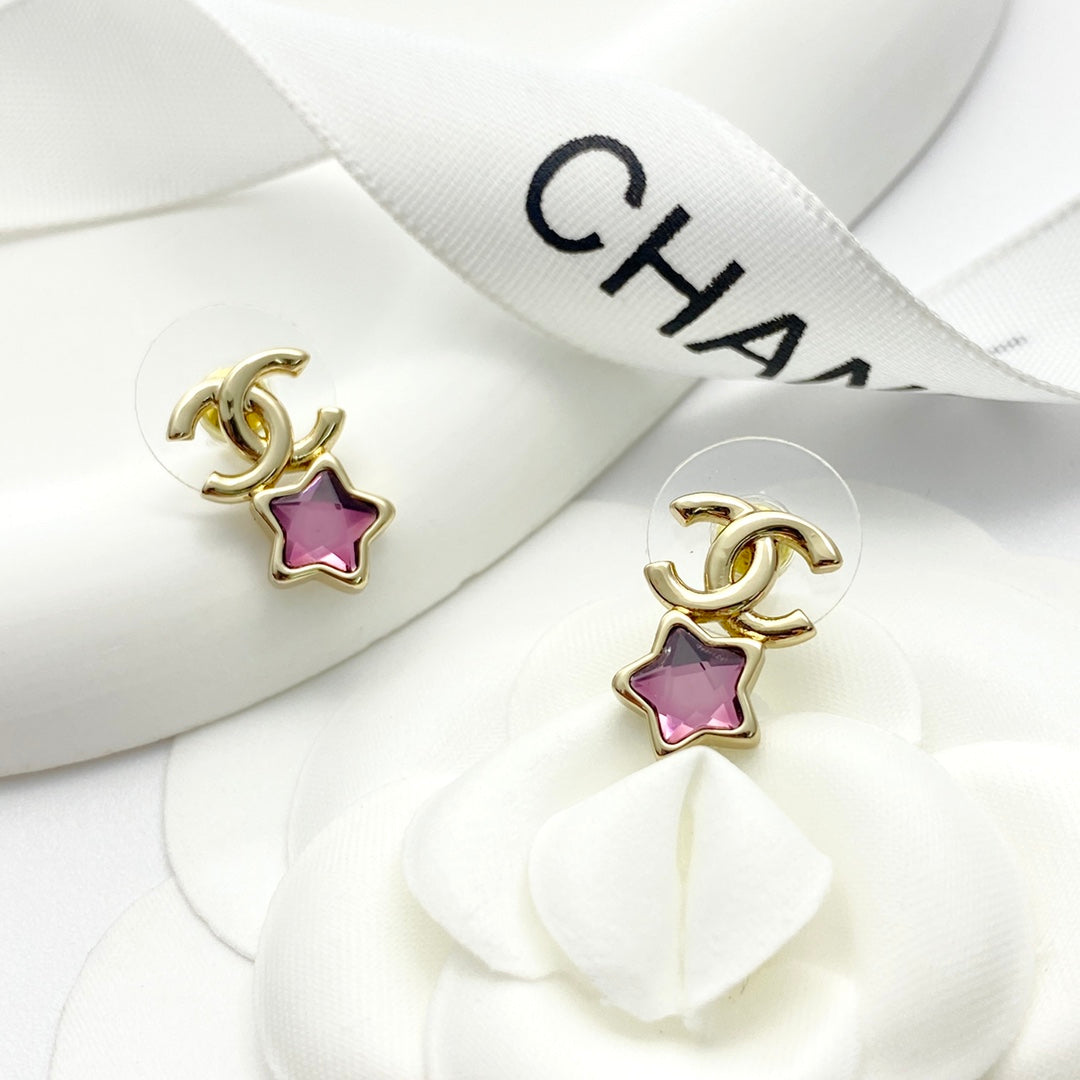 Pink diamond star earrings