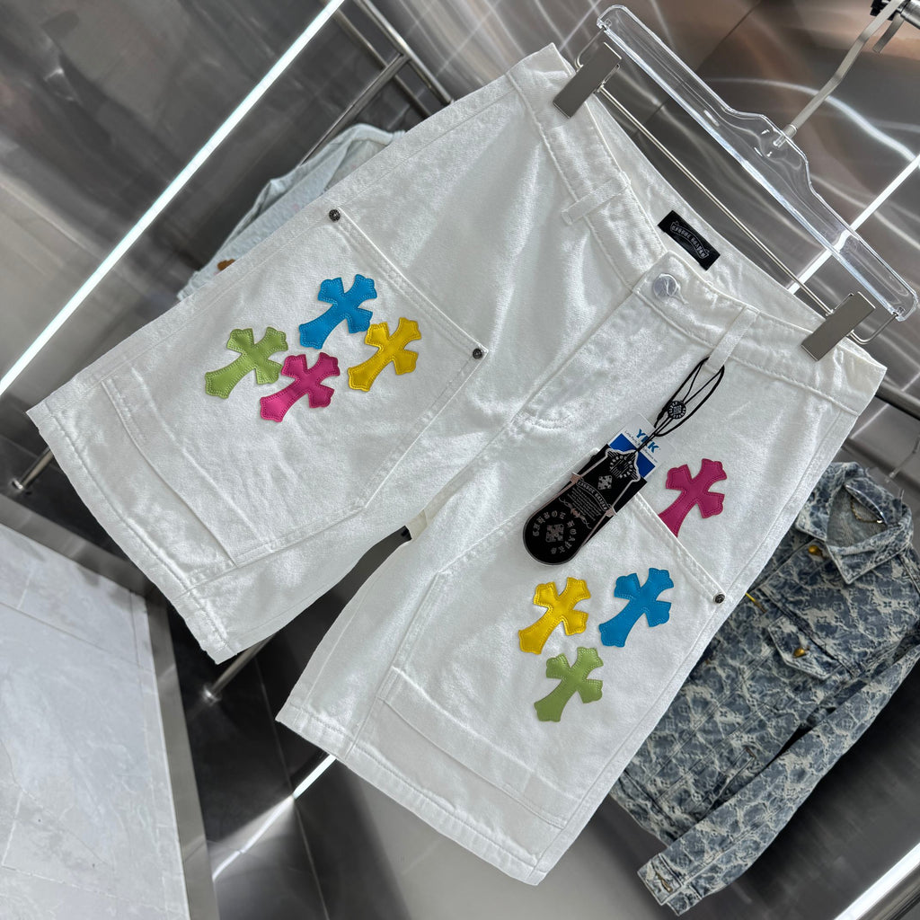 Embroidered cross denim shorts with torn holes