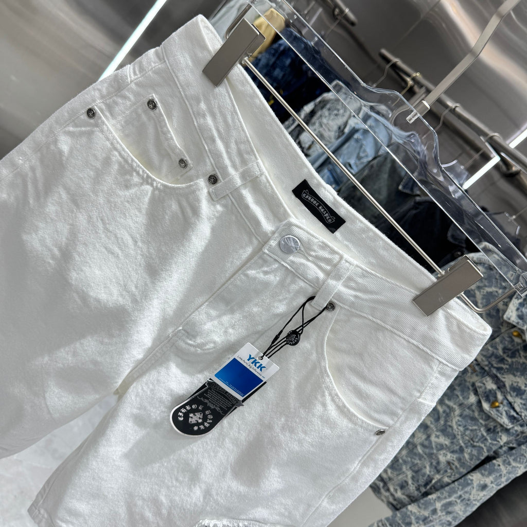 Embroidered cross denim shorts with torn holes