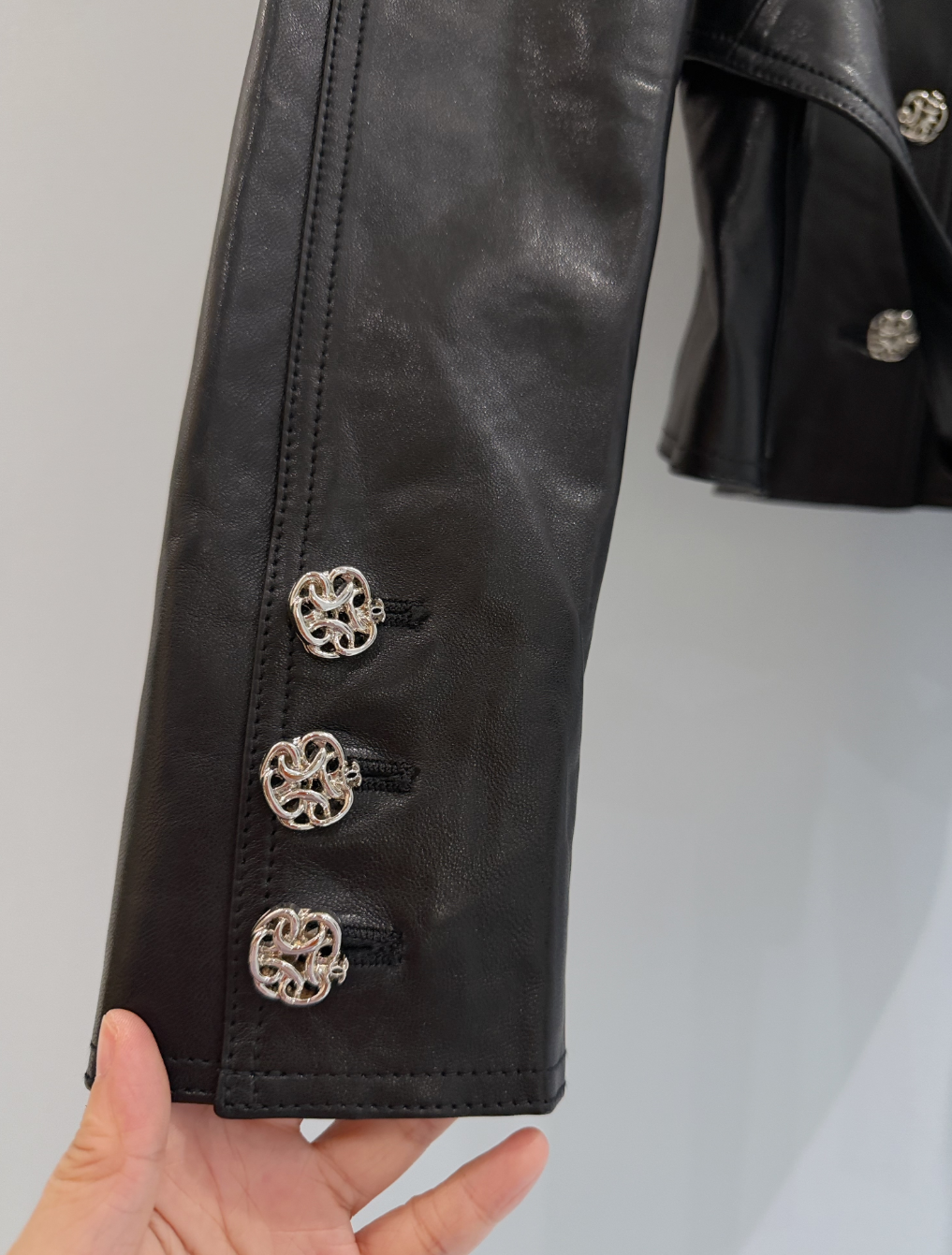 Stylish Black Long-Sleeve Cropped Jacket | Decorative Button Detail on Cuffs