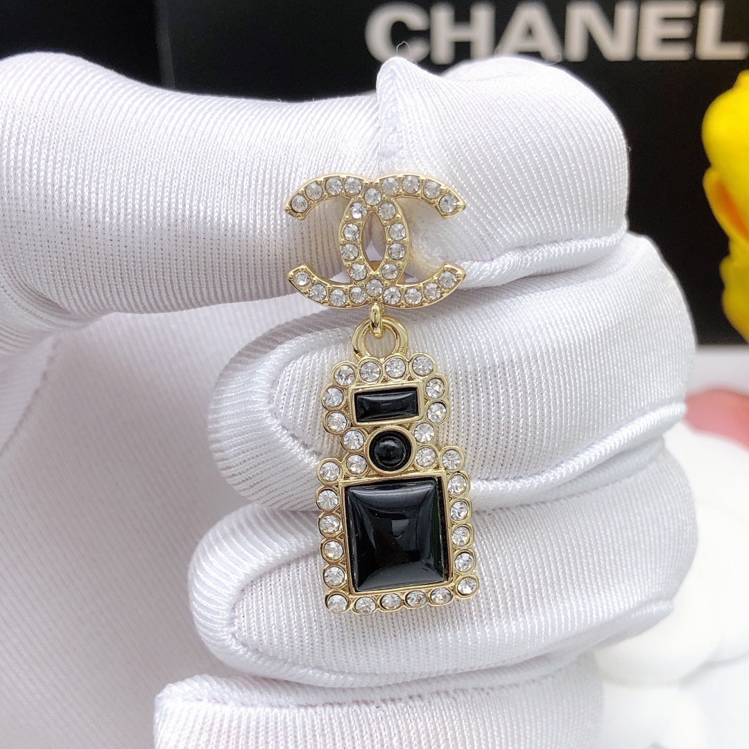 Perfume bottle earrings