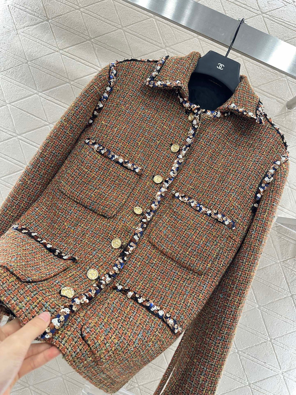 Lapel and belted dress jacket with beaded hem