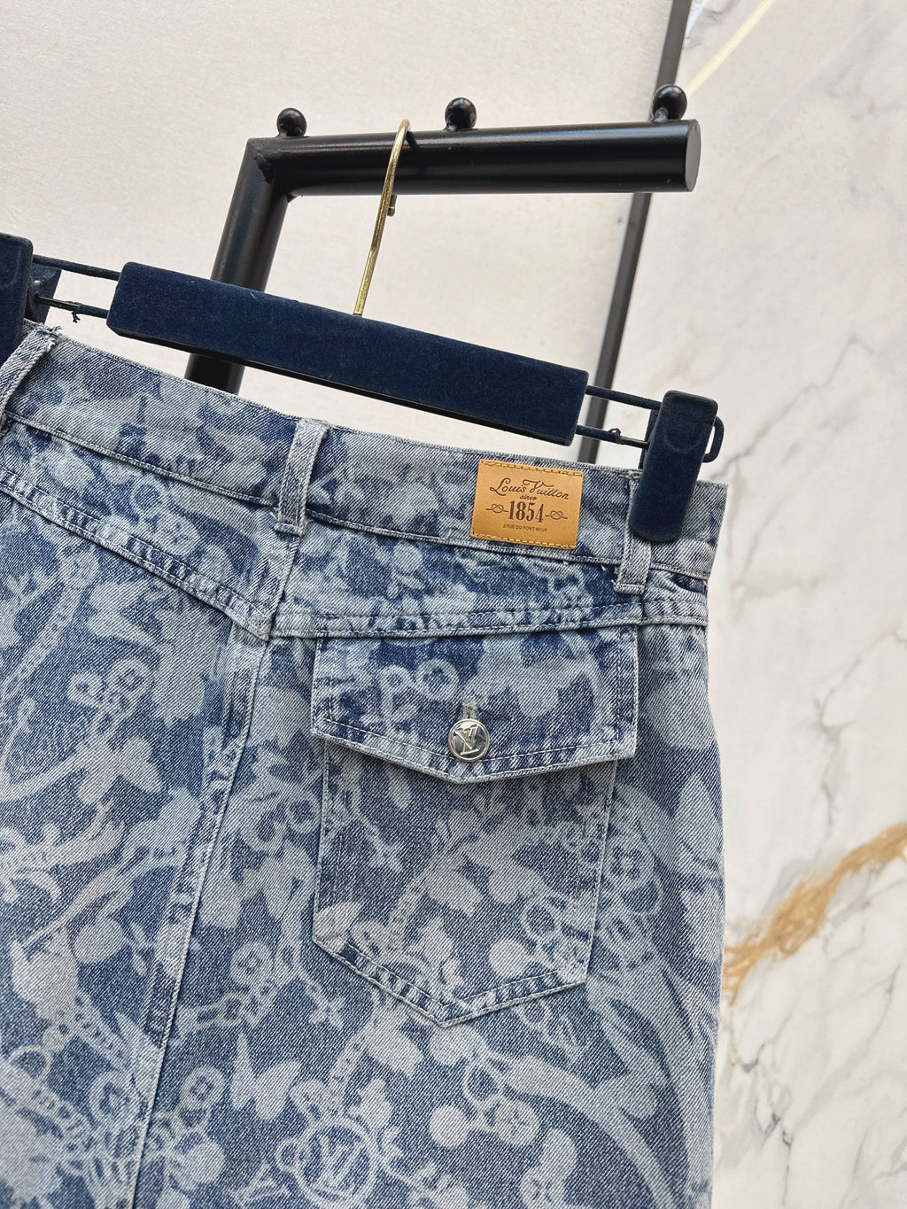 26ss Laser-studded chain floral denim midi skirt