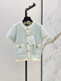 Short-sleeved cardigan with contrasting trim