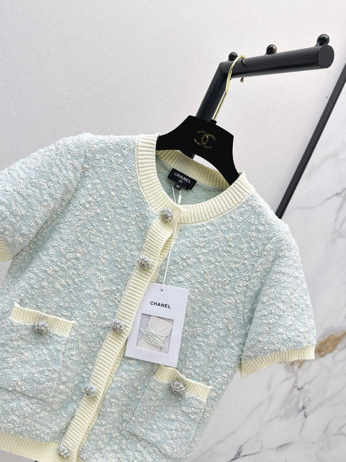 Short-sleeved cardigan with contrasting trim