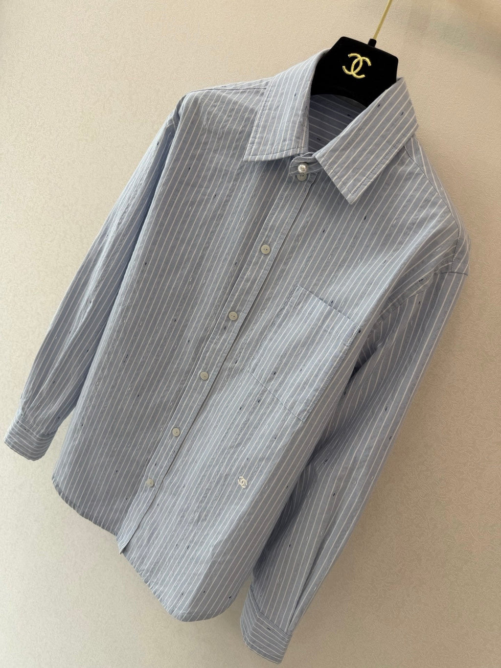Long vertical-striped shirt
