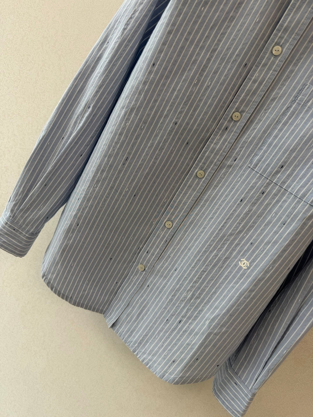 Long vertical-striped shirt