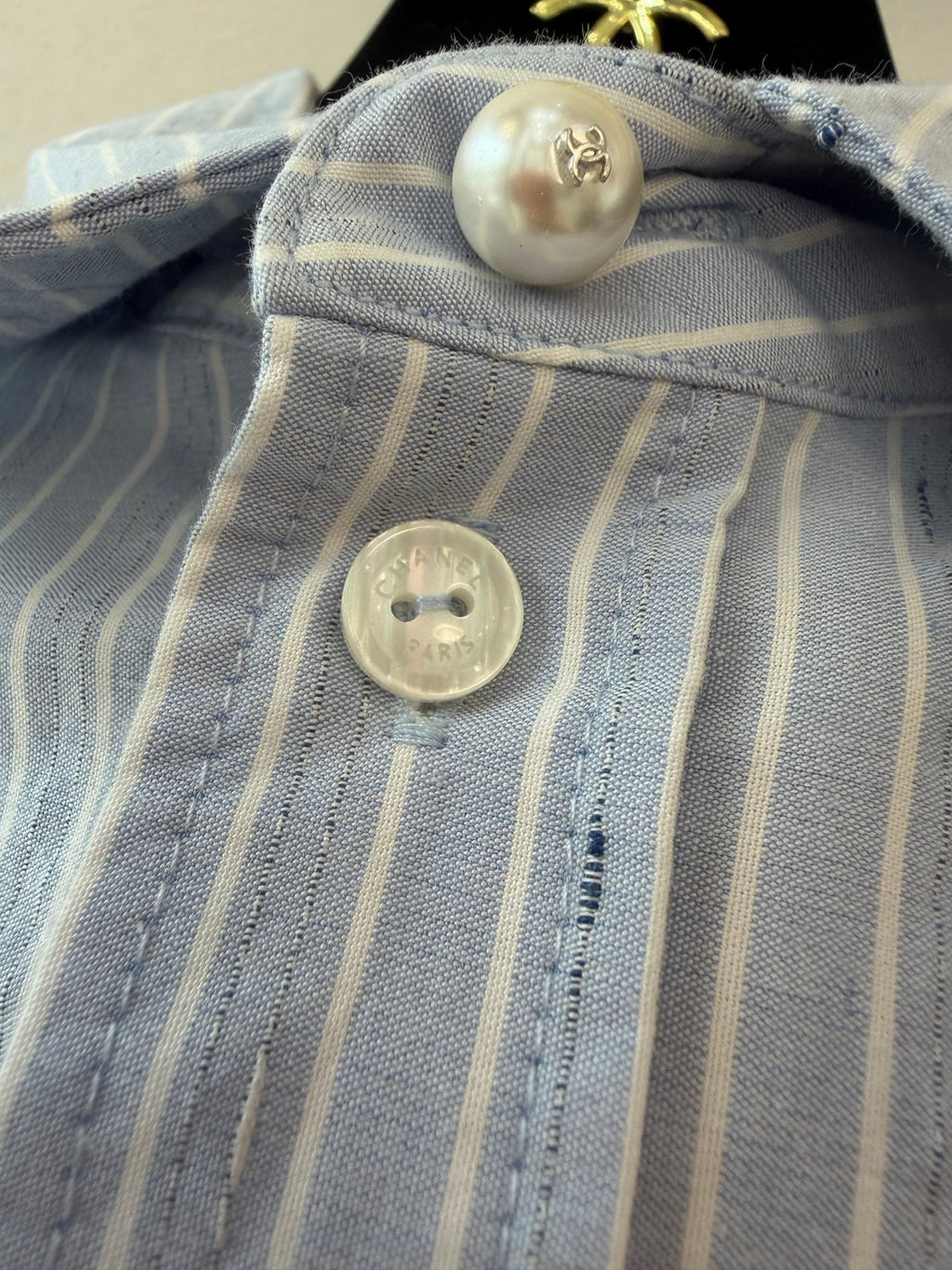 Long vertical-striped shirt