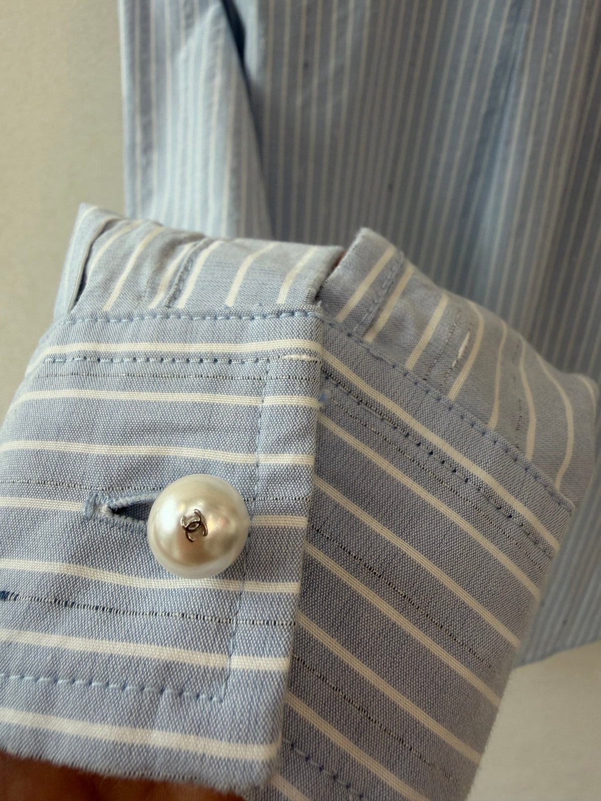 Long vertical-striped shirt