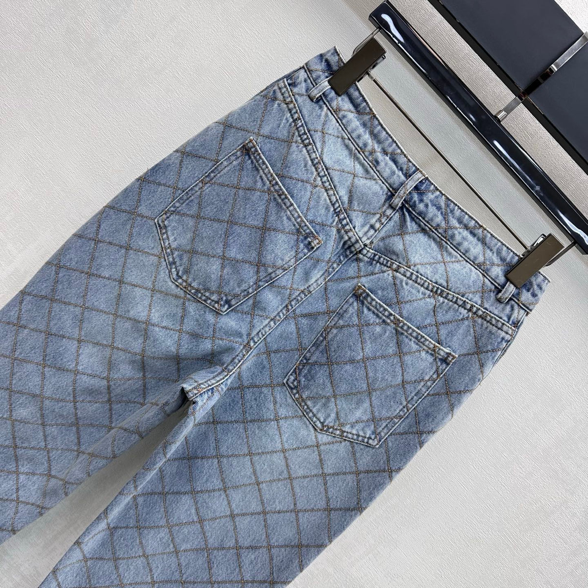 Quilted Denim Trousers with Chain Detail