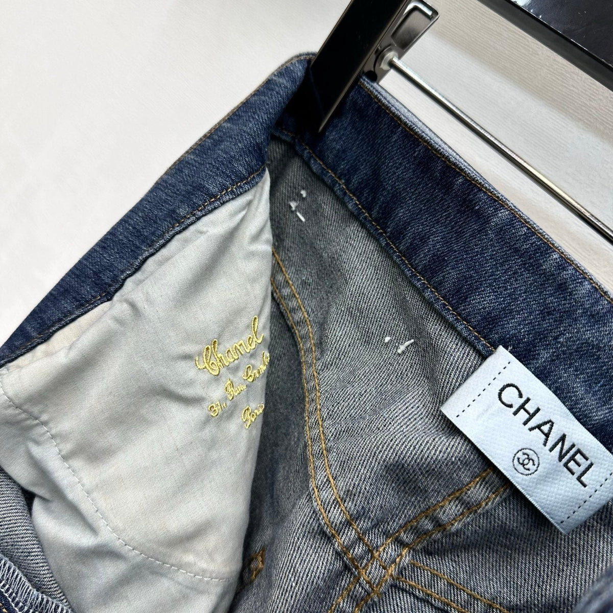 Leather-Patch Bootcut Denim Trousers