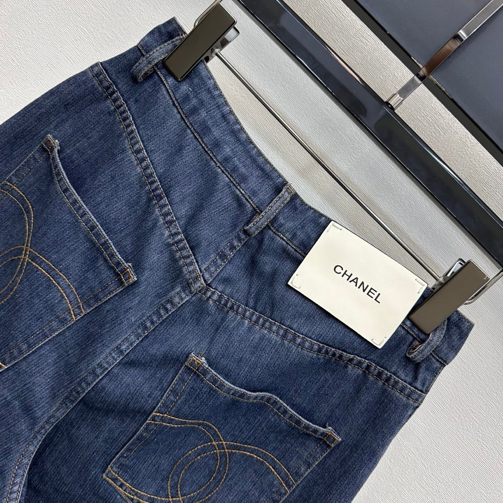 Leather-Patch Bootcut Denim Trousers