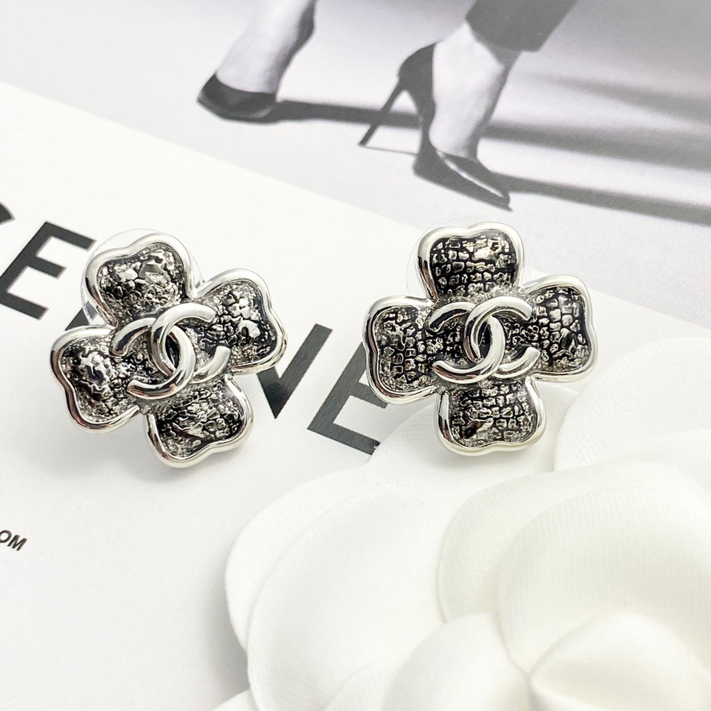 Black gold lace clover earrings