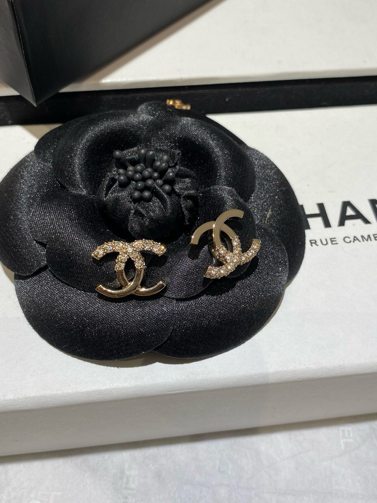 Half diamond gold earrings