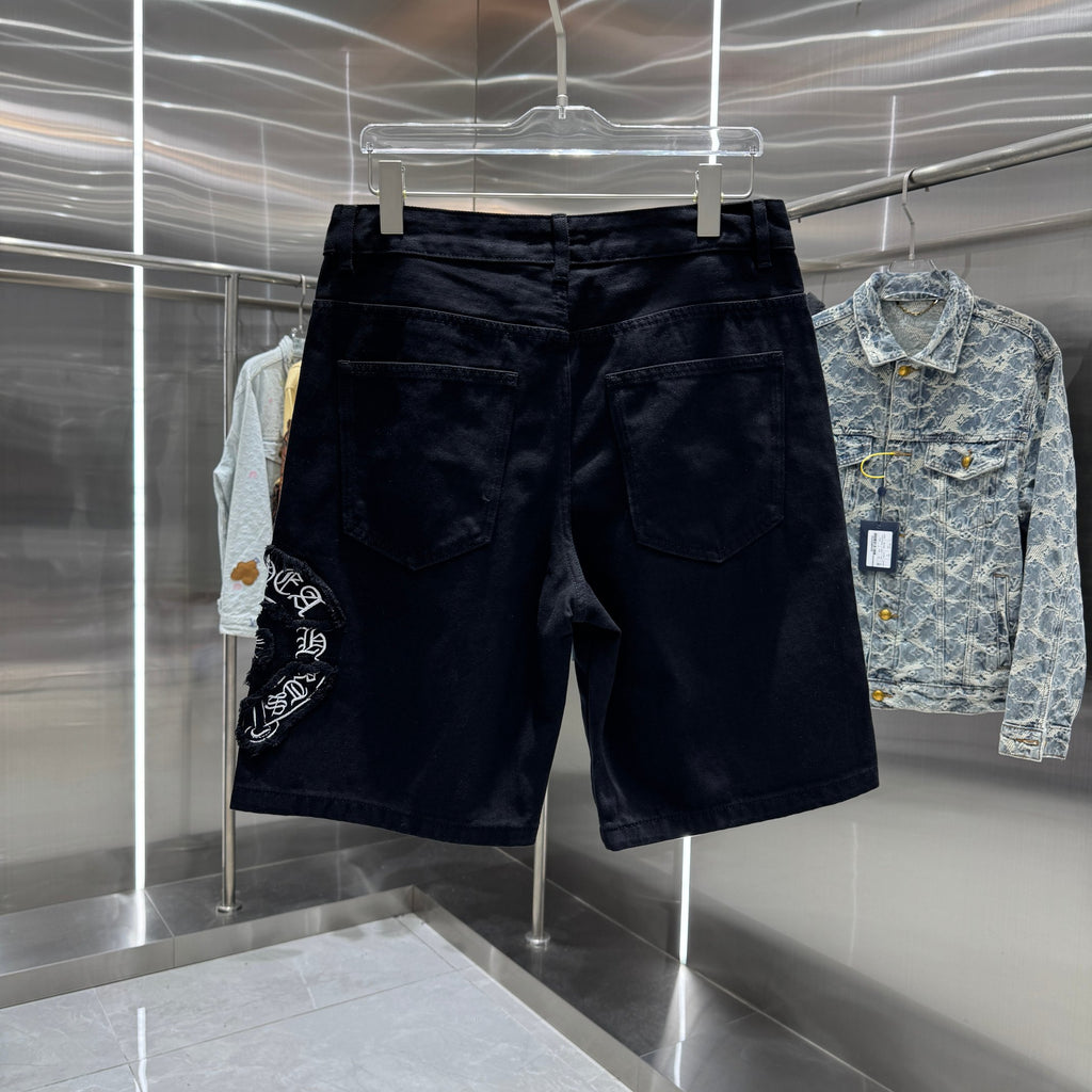 Embroidered cross denim shorts with torn holes