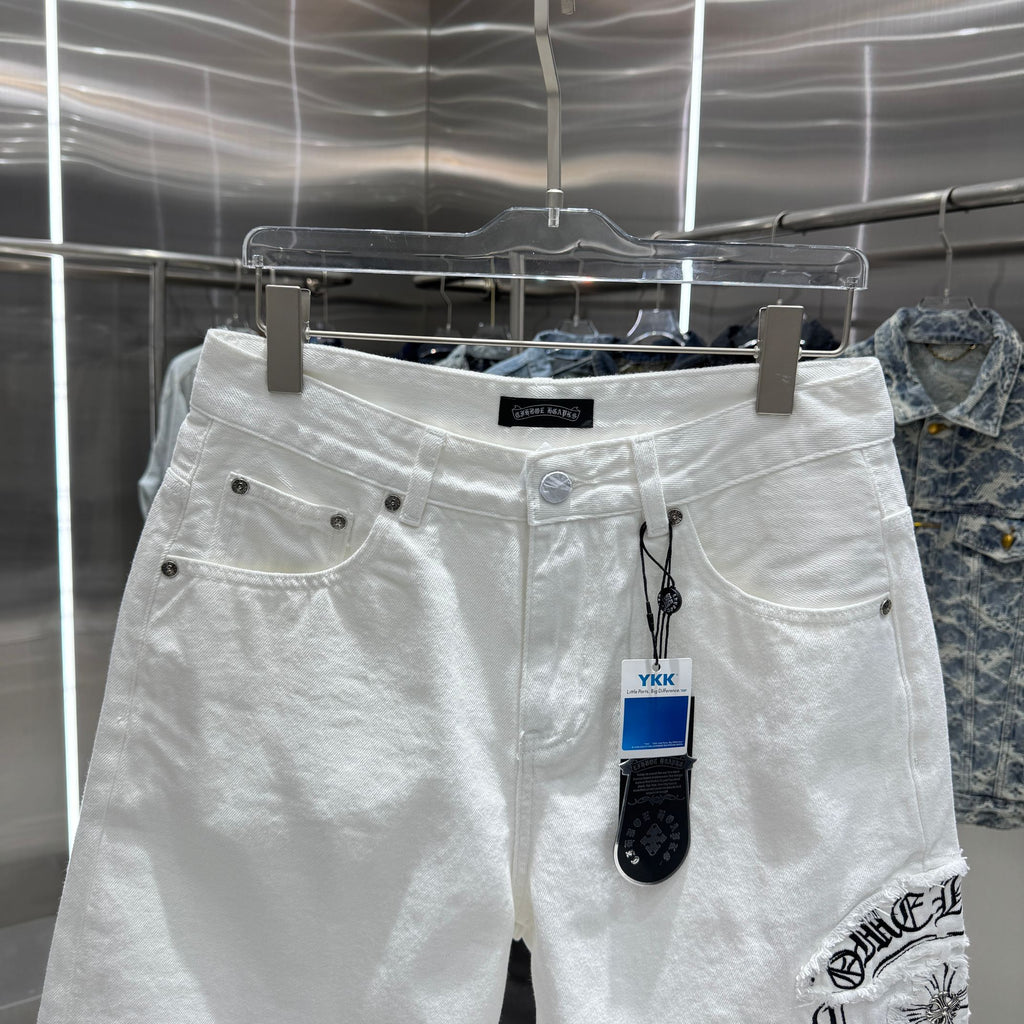 Embroidered cross denim shorts with torn holes