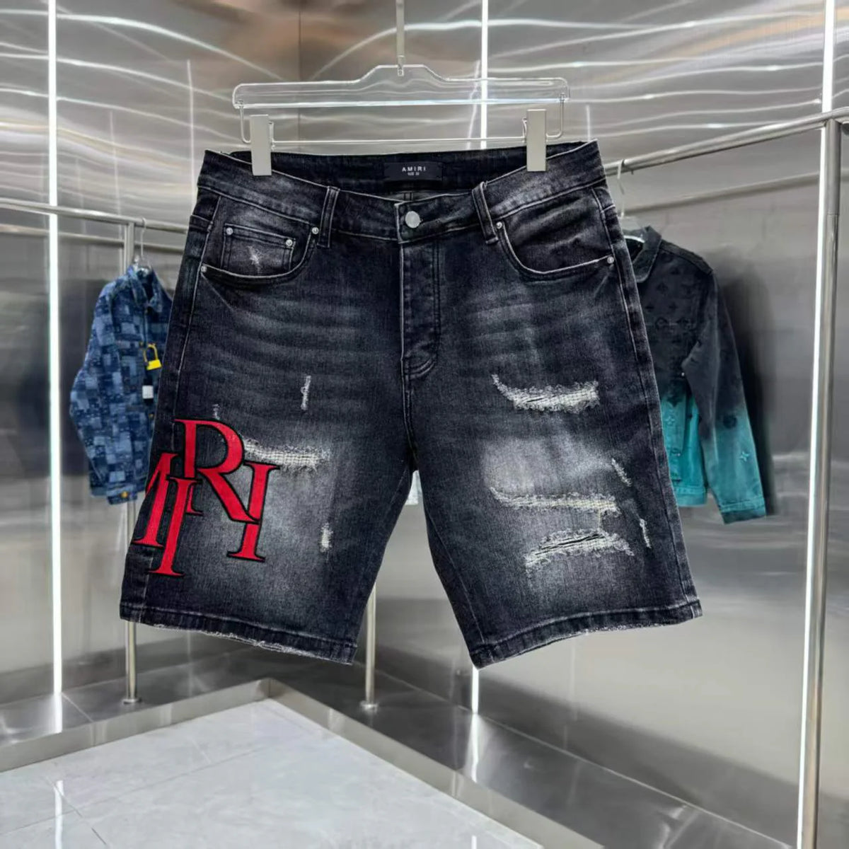 Ripped letter embroidered jeans