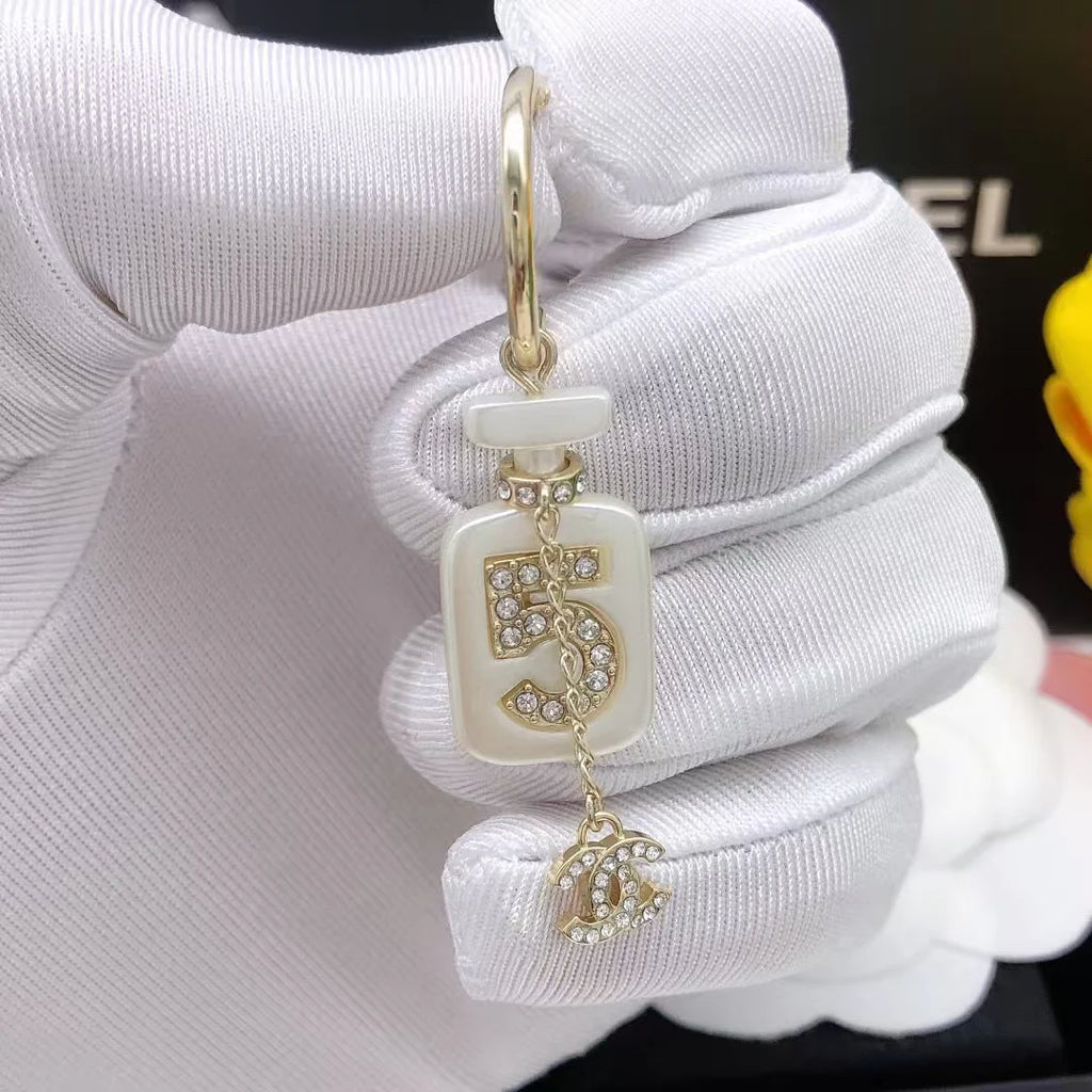 Perfume bottle earrings