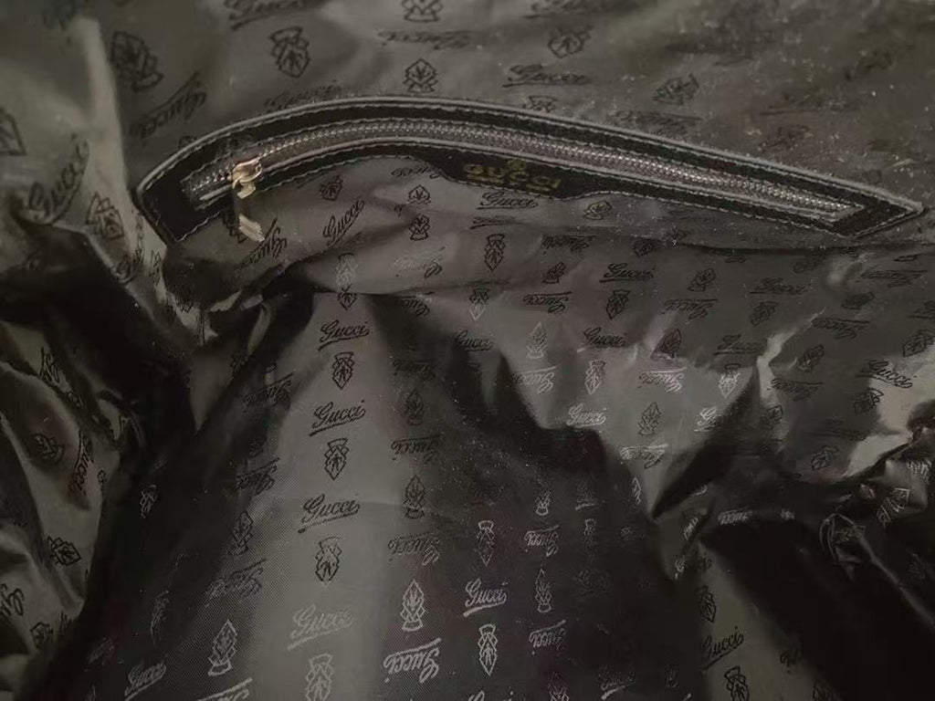 Graffiti coated Century joint travel bag