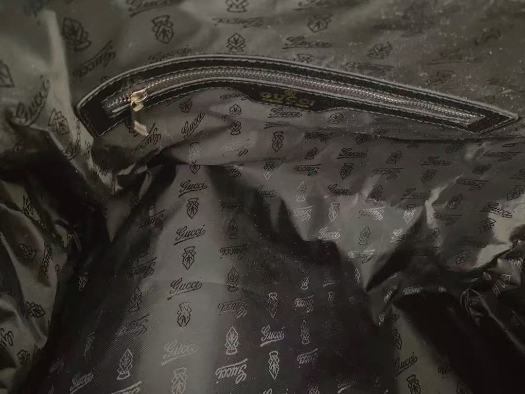 Graffiti coated Century joint travel bag