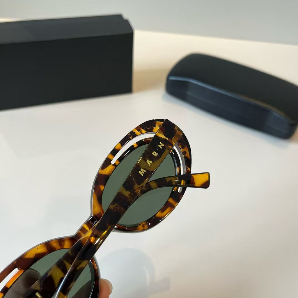Explosive elliptical sunglasses