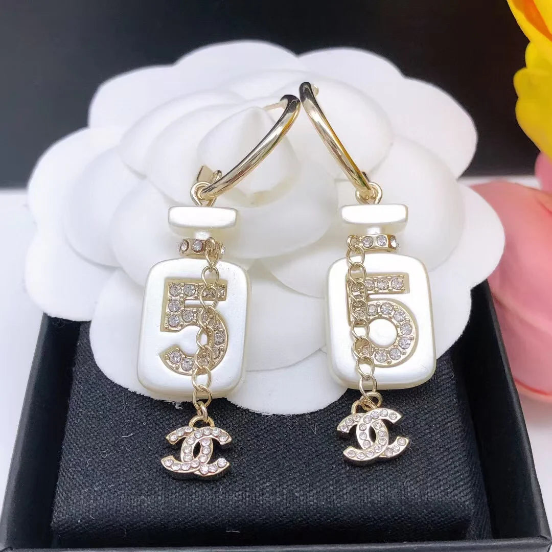 Perfume bottle earrings
