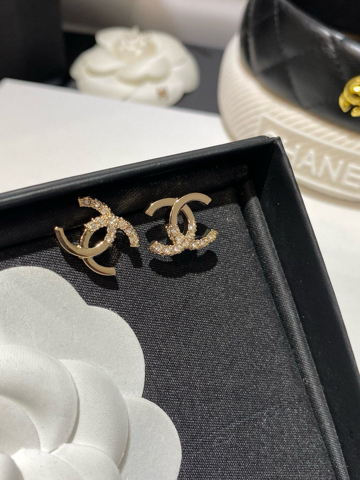 Half diamond gold earrings