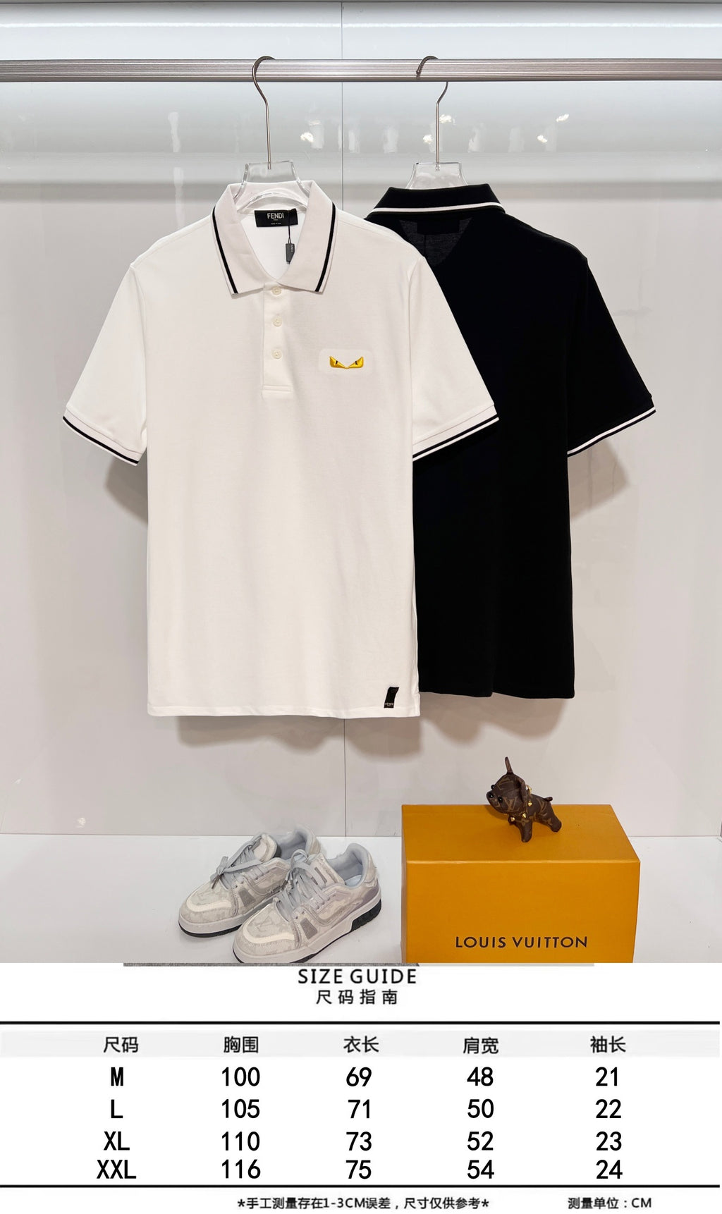 A polo shirt with embroidered letters on the eyes of a golden little monster on the chest