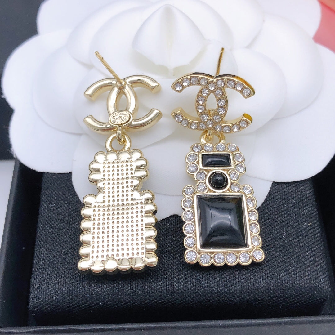 Perfume bottle earrings
