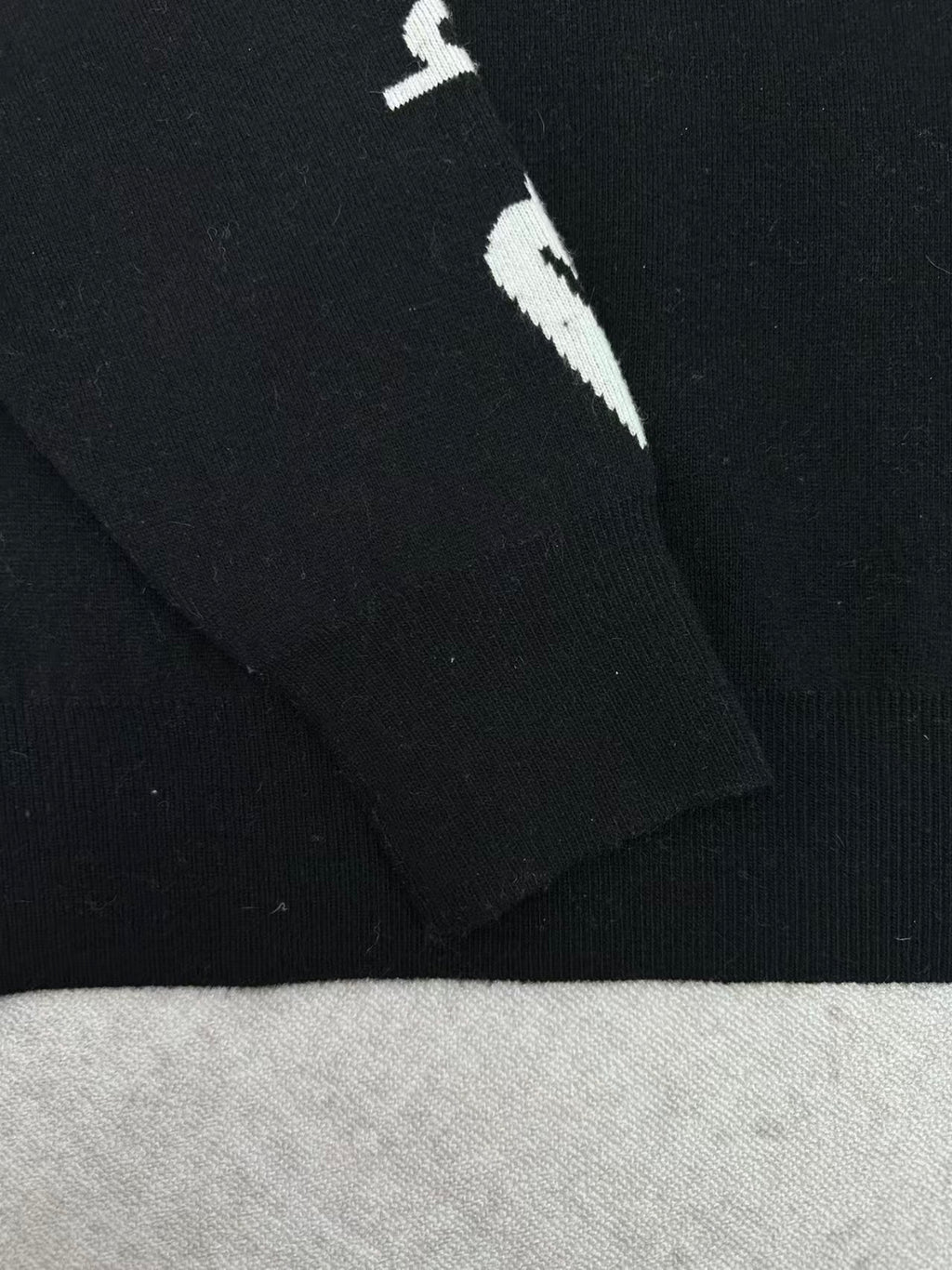 Embroidered jacquard sweater