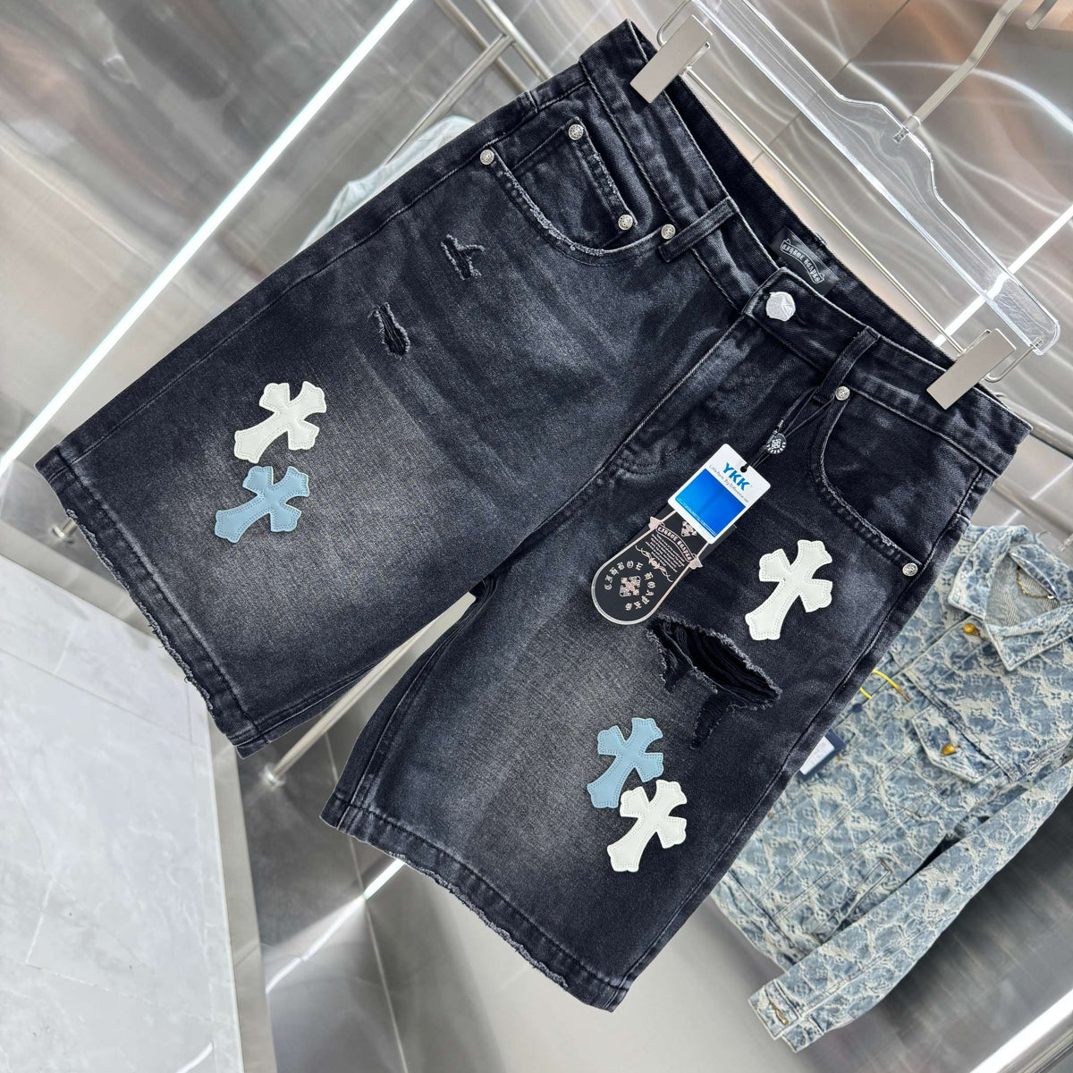 Spliced cross denim shorts