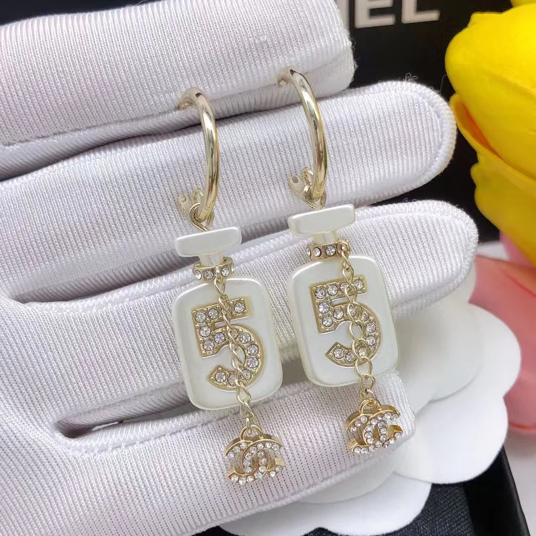 Perfume bottle earrings