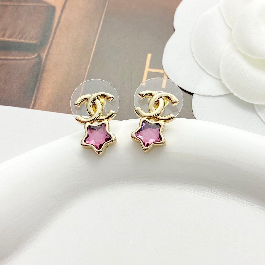 Pink diamond star earrings