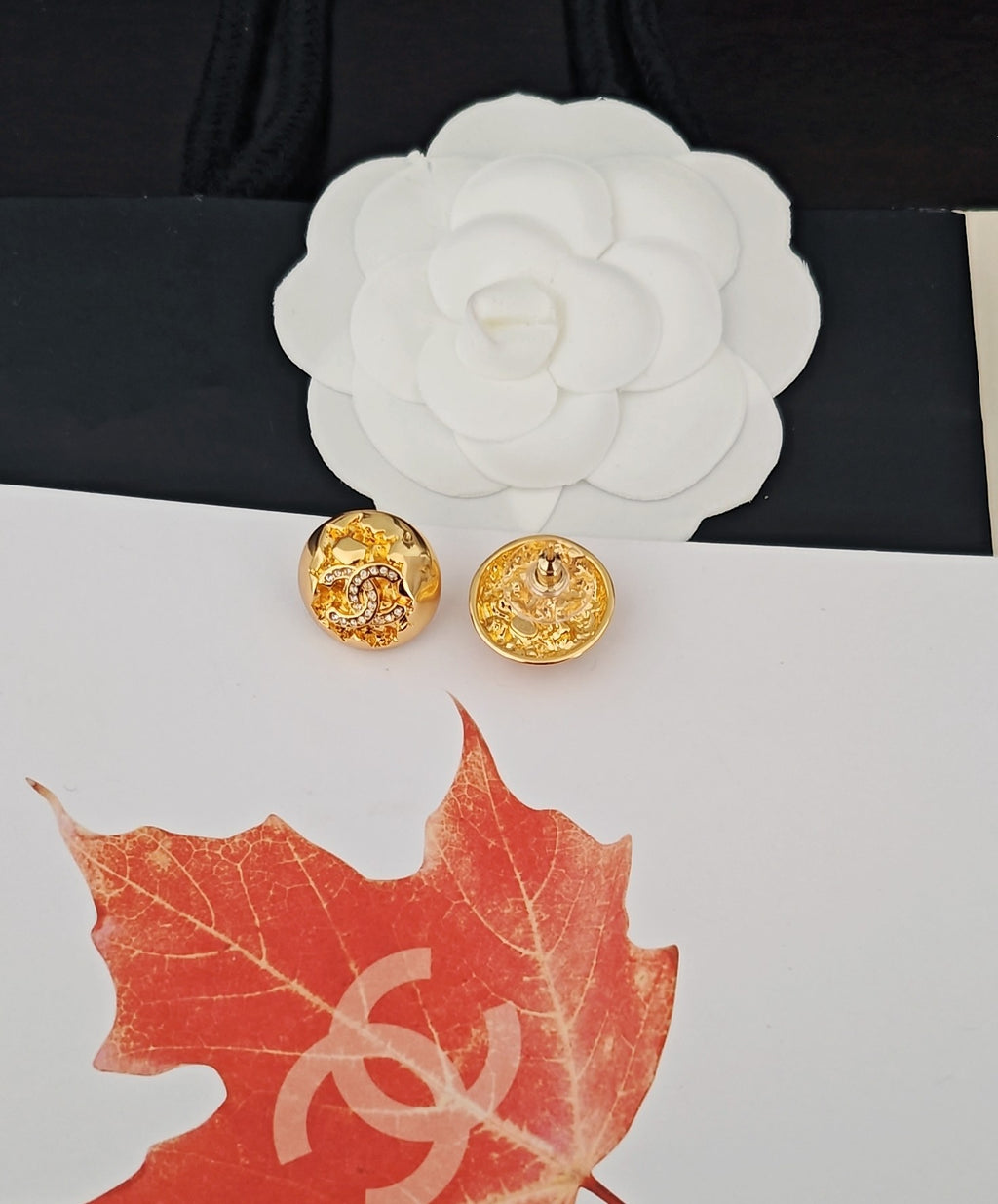 Golden spherical earrings