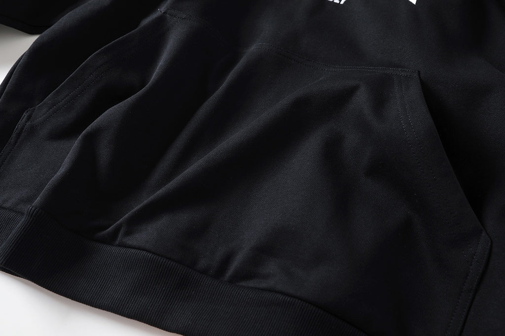 Reverse garbled letter embroidery hooded sweatshirt