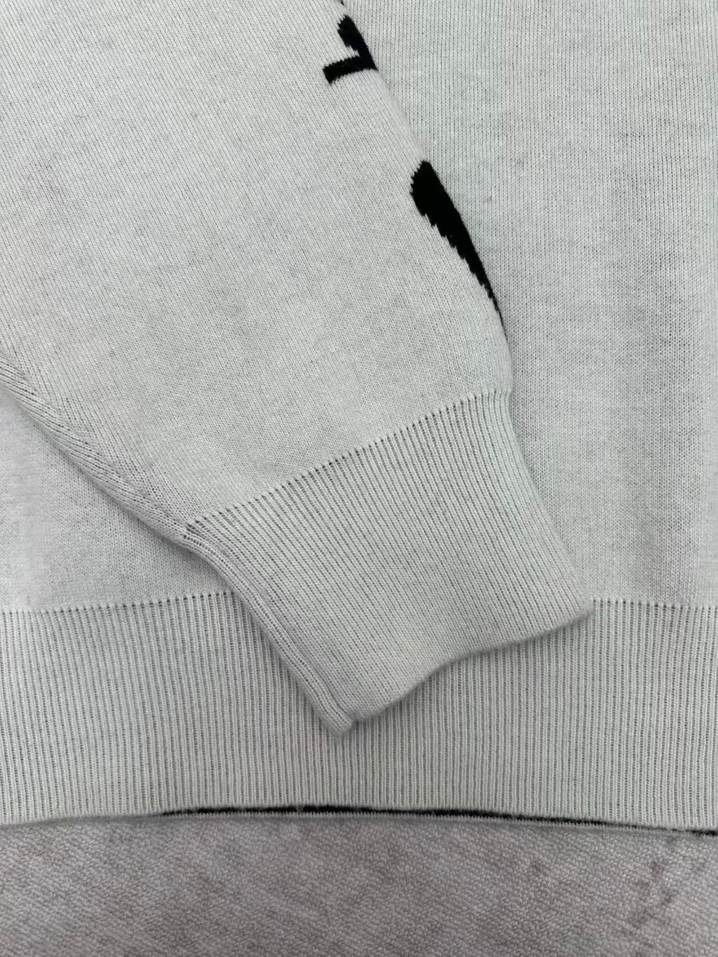 Embroidered jacquard sweater