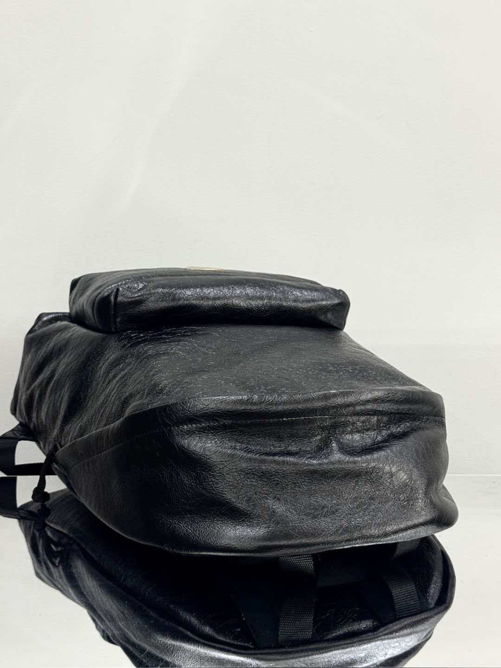 Oil cured leather backpack