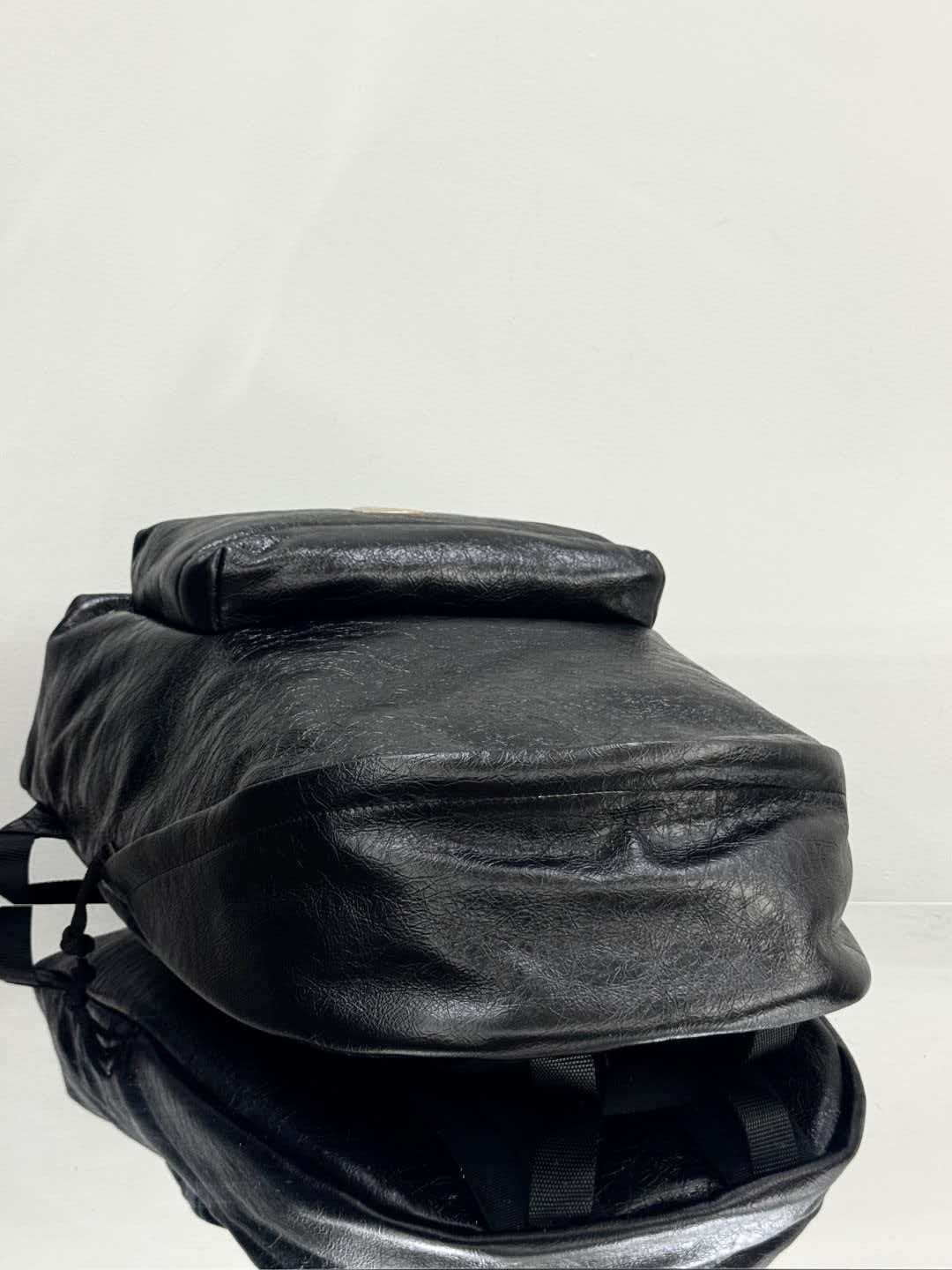Oil cured leather backpack