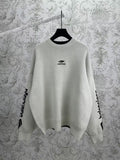 Embroidered jacquard sweater