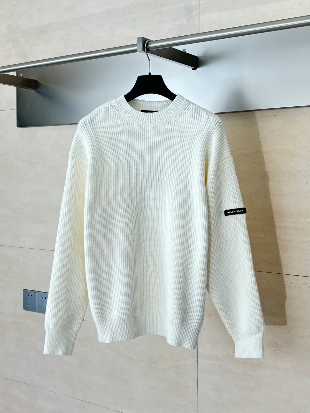 Knitted round neck sweater with armband