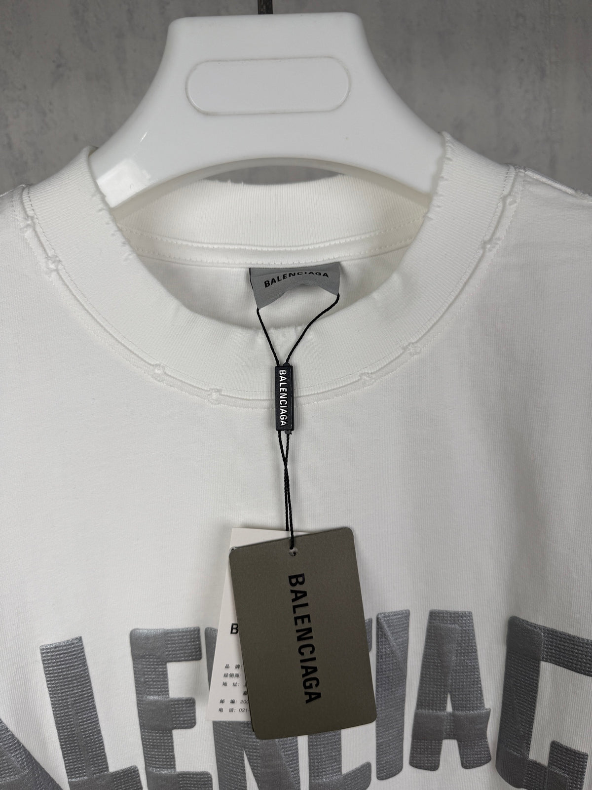 Adhesive tape letter pattern couple's short sleeved T-shirt