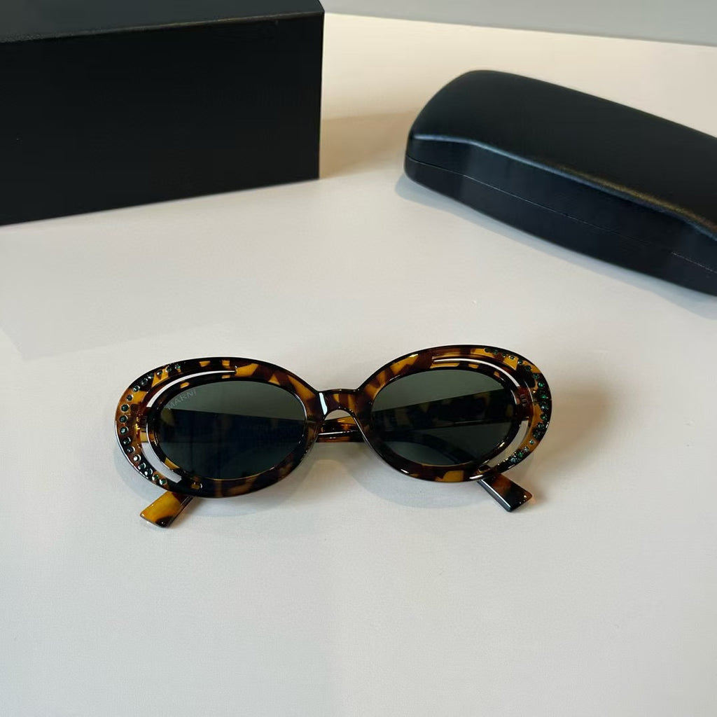 Explosive elliptical sunglasses