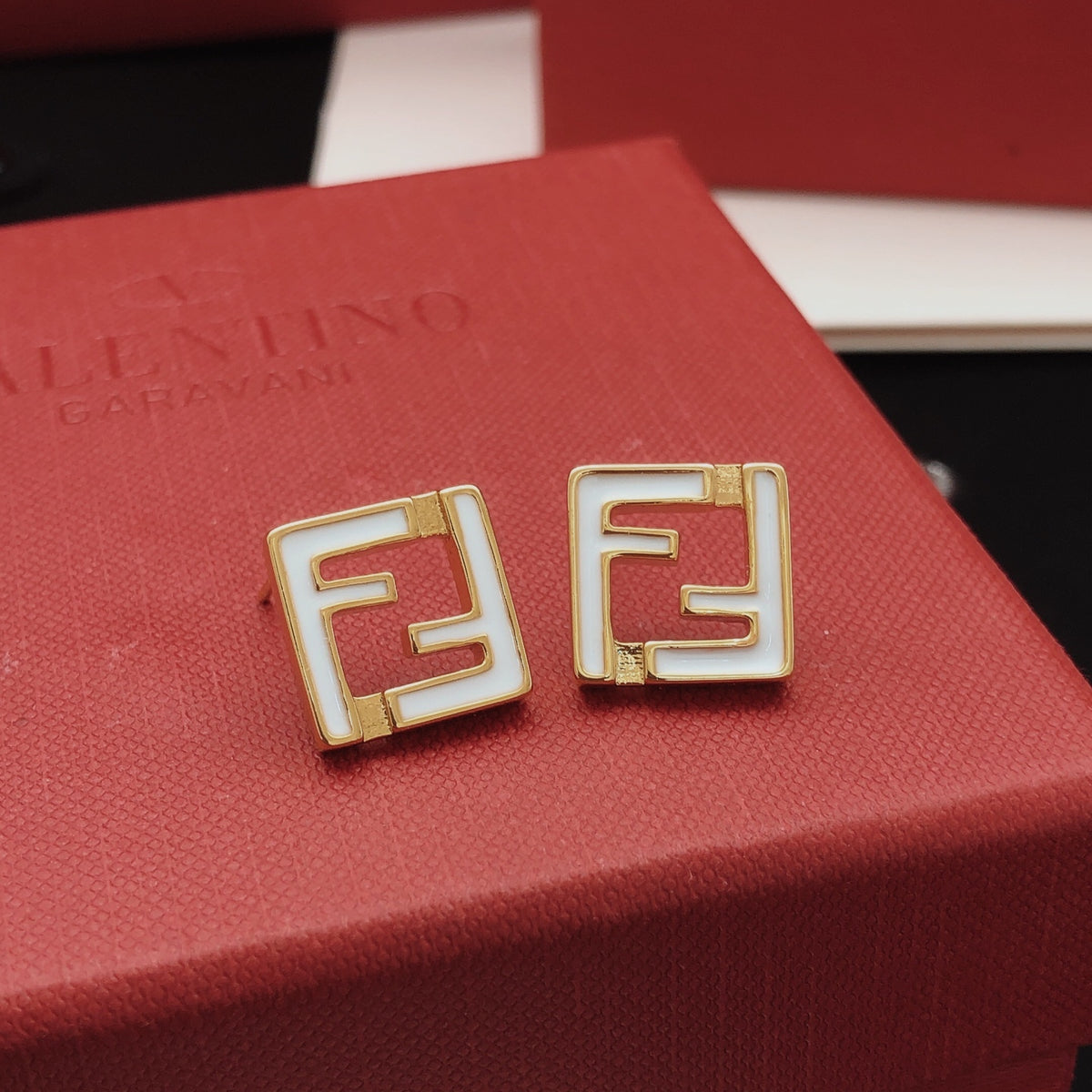 White square hollow earrings
