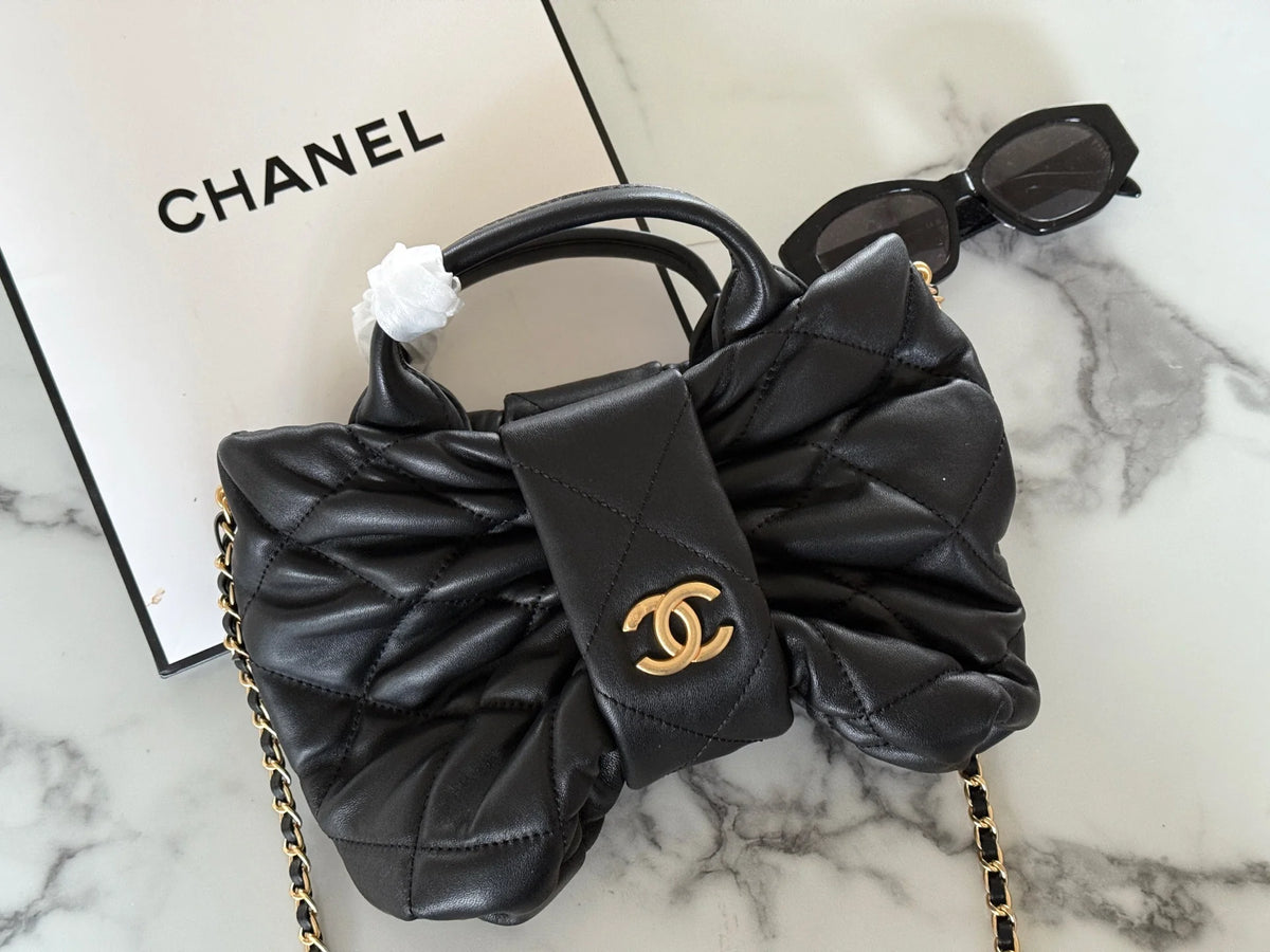 Bow handle chain sheepskin bag