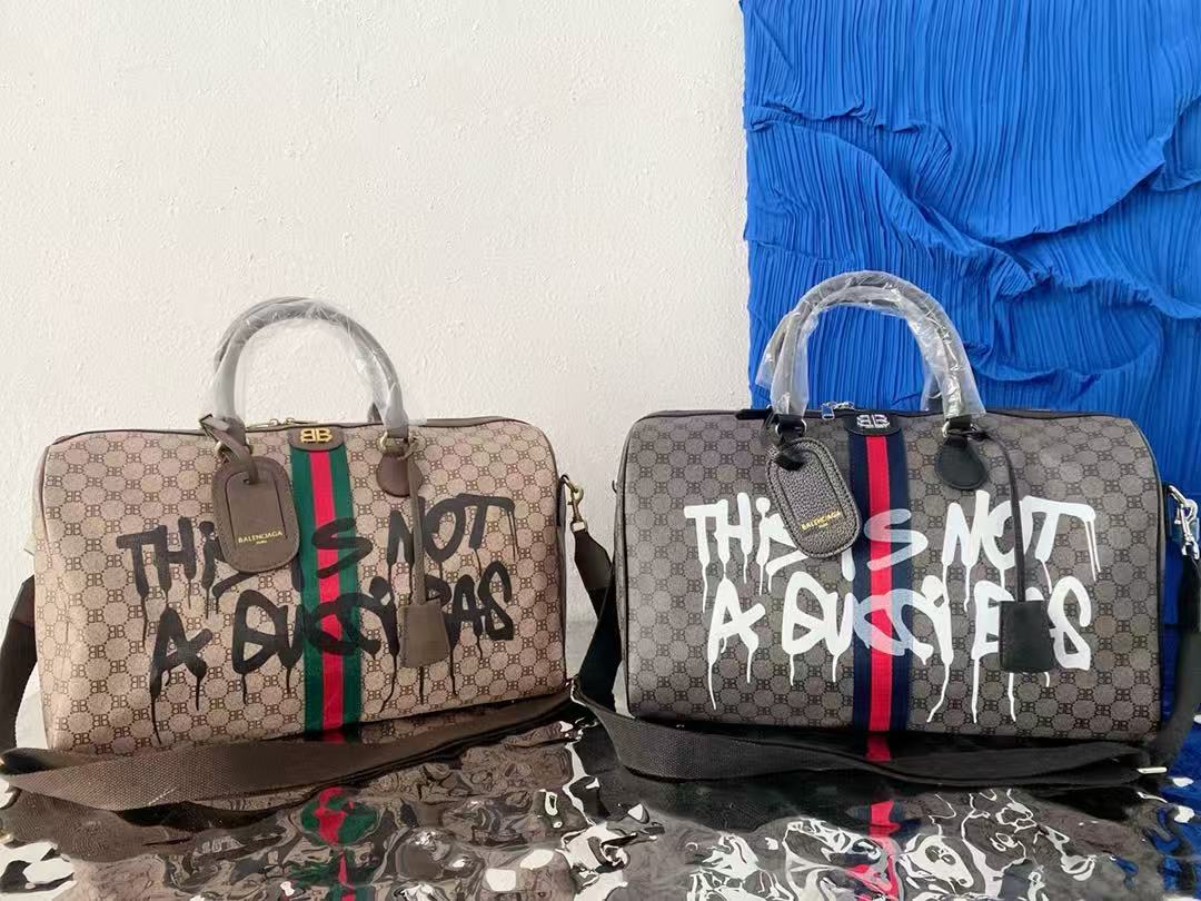 Graffiti coated Century joint travel bag