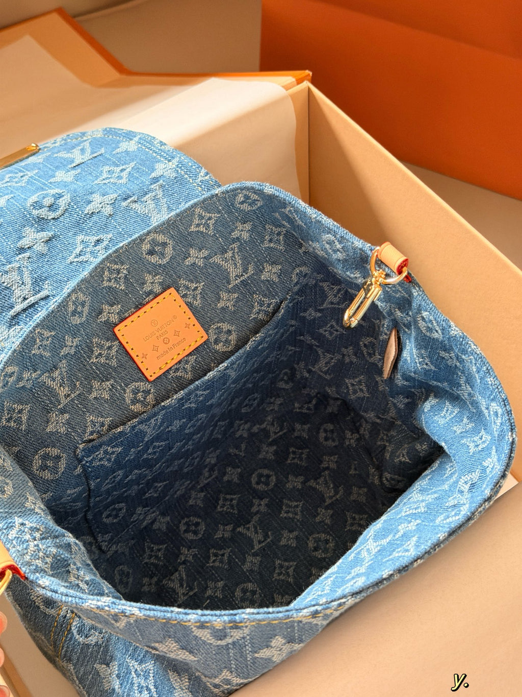 Blue denim double pocket triangular buckle backpack