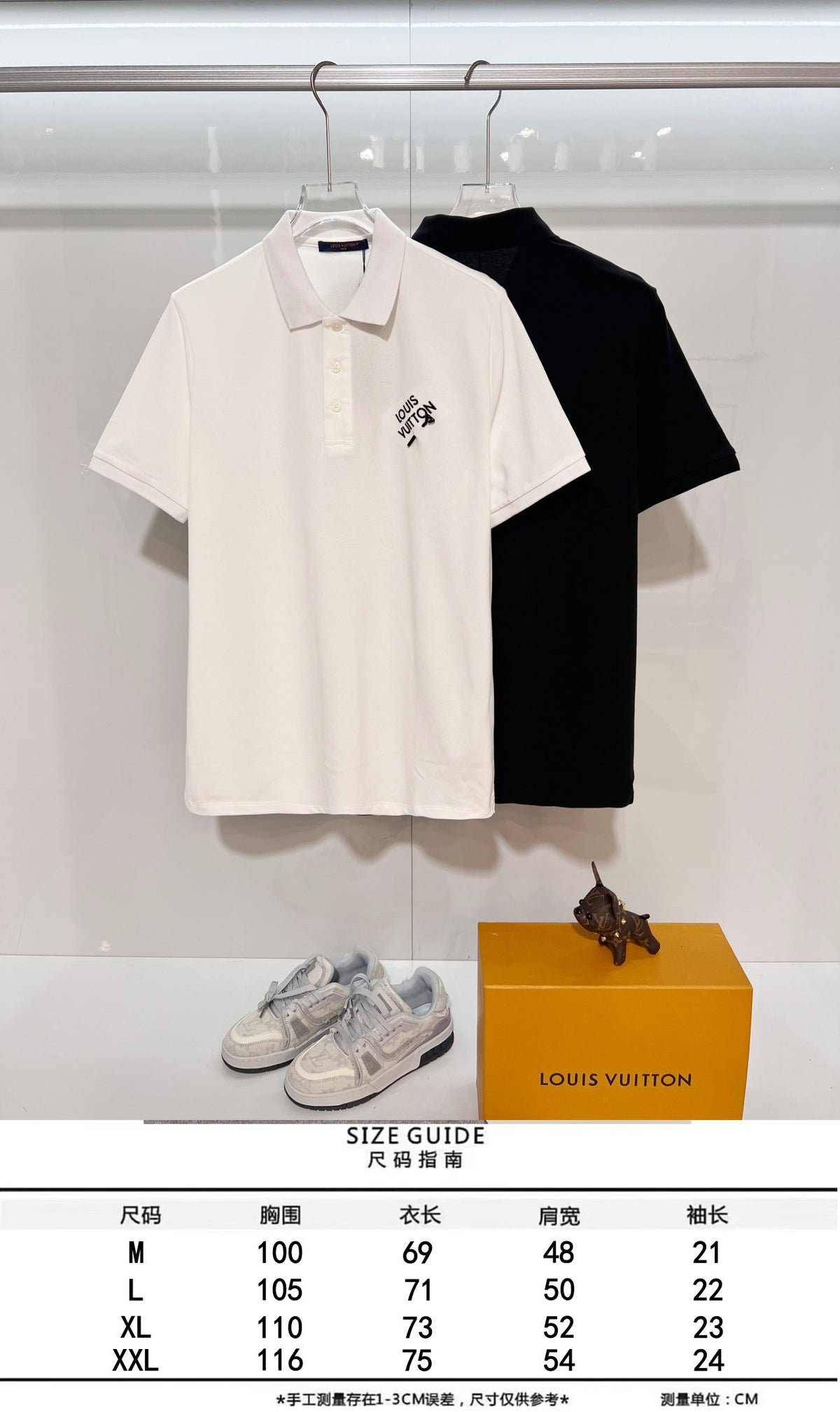A polo shirt with embroidered letters on the eyes of a golden little monster on the chest