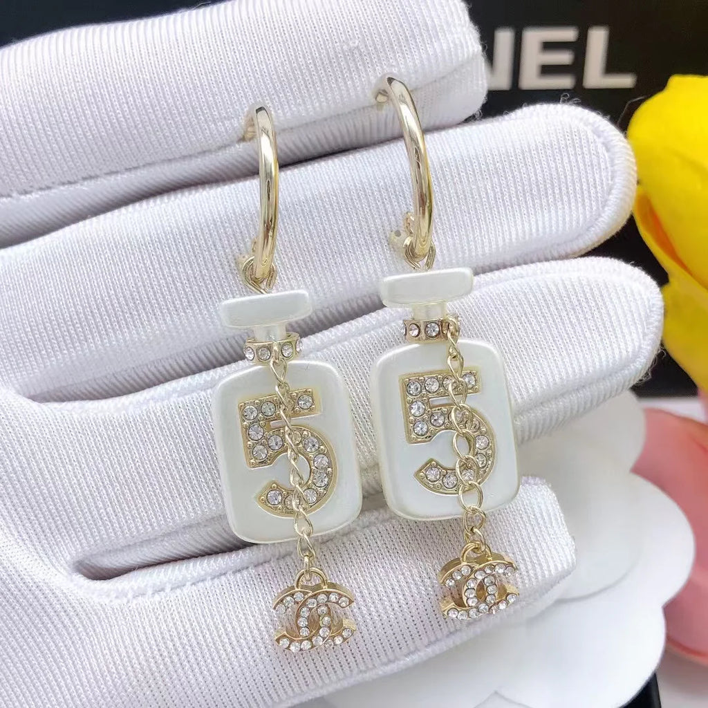 Perfume bottle earrings