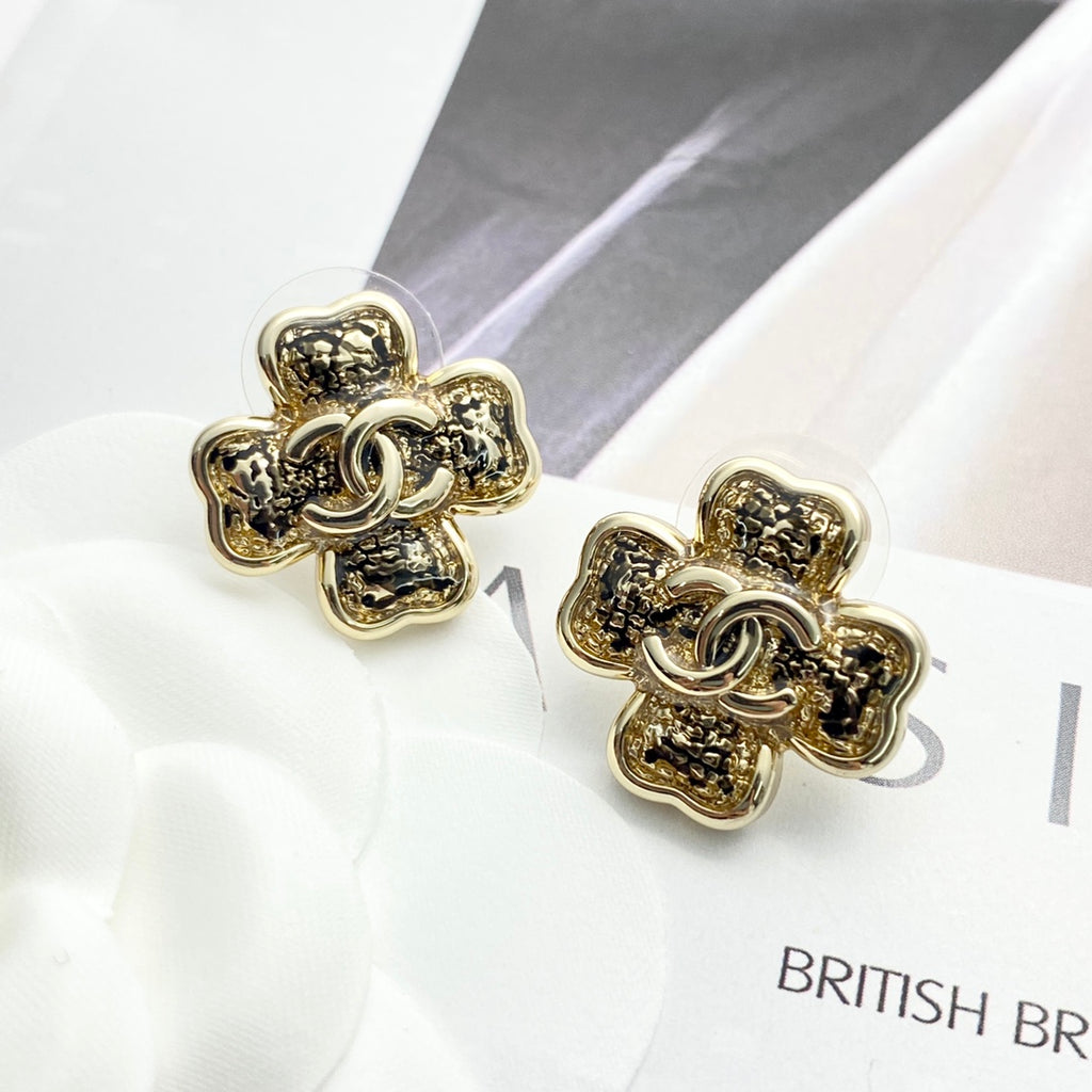 Black gold lace clover earrings